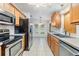 Modern kitchen with stainless steel appliances and breakfast nook at 37449 Gill Ave, Zephyrhills, FL 33541