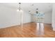Bright living room with light wood flooring and access to a patio at 37449 Gill Ave, Zephyrhills, FL 33541