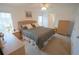 Spacious main bedroom with a king-size bed and ample storage at 37449 Gill Ave, Zephyrhills, FL 33541