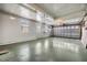 Large garage with high ceilings and ample storage at 37449 Gill Ave, Zephyrhills, FL 33541