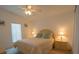 Cozy bedroom with a queen-size bed and nightstands at 37449 Gill Ave, Zephyrhills, FL 33541