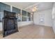 Florida room with tiled flooring, and access to outdoors at 37449 Gill Ave, Zephyrhills, FL 33541