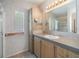 Bathroom with vanity, mirror, and shower/tub combo at 37449 Gill Ave, Zephyrhills, FL 33541