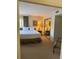 Spacious Primary bedroom with king-size bed and mirrored closet at 4774 Fox Hunt Dr # C115 &C113, Wesley Chapel, FL 33543