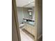 Clean bathroom with marble vanity and striped wallpaper at 4774 Fox Hunt Dr # C115 &C113, Wesley Chapel, FL 33543