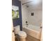 Modern bathroom with a bathtub, shower, and stylish decor at 4774 Fox Hunt Dr # C115 &C113, Wesley Chapel, FL 33543