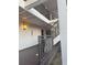 Stairwell leading to condo units with dark brown railings at 4774 Fox Hunt Dr # C115 &C113, Wesley Chapel, FL 33543