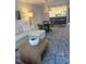 Spacious living room featuring a comfortable sectional sofa and stylish coffee table at 4774 Fox Hunt Dr # C115 &C113, Wesley Chapel, FL 33543