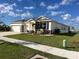 Two-car garage home with curb appeal at 1027 Ocean Spray Dr, Ruskin, FL 33570