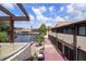 Waterfront views of a canal and boat docks with residential amenities at 2571 Cyprus Dr # 1-202, Palm Harbor, FL 34684