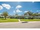 Front view of a ranch-style house with green lawn at 2740 Whitebridge Dr # A, Palm Harbor, FL 34684