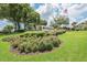 Inviting community entrance with landscaping and signage at 2740 Whitebridge Dr # A, Palm Harbor, FL 34684