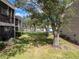 Spacious backyard with large trees providing shade at 9700 Starkey Rd # 312, Seminole, FL 33777