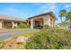 Community building entrance with landscaping and fountain at 9950 62Nd N Ter # 106, St Petersburg, FL 33708