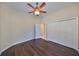 Spacious bedroom with double door closet and wood flooring at 1357 Emerald Dunes Dr, Sun City Center, FL 33573