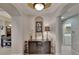 Bright and spacious entryway with decorative console at 1357 Emerald Dunes Dr, Sun City Center, FL 33573