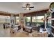 Spacious living room with golf course views and comfortable seating at 1357 Emerald Dunes Dr, Sun City Center, FL 33573