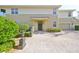 Townhouse entrance with paved driveway at 1357 Emerald Dunes Dr, Sun City Center, FL 33573