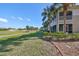 Exterior view of building and landscaping at 1357 Emerald Dunes Dr, Sun City Center, FL 33573