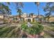 Townhouse with landscaping and walkway at 1357 Emerald Dunes Dr, Sun City Center, FL 33573