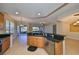 Open kitchen features a large island and breakfast bar at 1357 Emerald Dunes Dr, Sun City Center, FL 33573