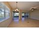 Bright dining room with sliding glass doors leading to a patio at 1357 Emerald Dunes Dr, Sun City Center, FL 33573