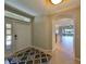 Inviting entryway, featuring tile floors and view to the kitchen at 1357 Emerald Dunes Dr, Sun City Center, FL 33573
