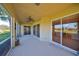 Relaxing screened patio with sliding glass doors at 1357 Emerald Dunes Dr, Sun City Center, FL 33573