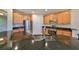 Modern kitchen with stainless steel appliances and granite countertops at 1357 Emerald Dunes Dr, Sun City Center, FL 33573