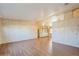 Spacious living room featuring light walls and wood-look floors at 384 Tranquil Ct, Oldsmar, FL 34677