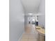 Hallway with tile floor leads into living space of open concept home at 1467 Monte St, Port Charlotte, FL 33952