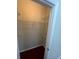 Walk-in closet with wire shelving at 18001 Richmond Place Dr # 425, Tampa, FL 33647