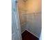 Another walk-in closet with wire shelving at 18001 Richmond Place Dr # 425, Tampa, FL 33647
