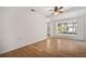 Simple dining room with hardwood floors and large window at 3310 W Palmira Ave, Tampa, FL 33629