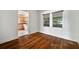 Bright dining room with hardwood floors and kitchen access at 3310 W Palmira Ave, Tampa, FL 33629