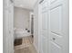 Bathroom with shower, bathtub, and double closets at 4234 Chesterfield Cir, Palm Harbor, FL 34683