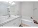Bathroom features a vanity, bathtub, and shower at 4234 Chesterfield Cir, Palm Harbor, FL 34683