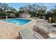 Refreshing community pool with plenty of lounge chairs at 4234 Chesterfield Cir, Palm Harbor, FL 34683
