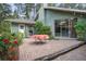 Backyard patio perfect for entertaining with lush landscaping and brick pavers at 5143 Culbreath Rd, Brooksville, FL 34601