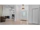 Foyer with decorative lighting and easy access to living areas at 5143 Culbreath Rd, Brooksville, FL 34601