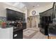 Modern kitchen features a skylight, granite countertops, and stainless steel appliances at 5143 Culbreath Rd, Brooksville, FL 34601