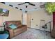 Cozy living room featuring a comfortable brown leather sofa and colorful area rug at 5143 Culbreath Rd, Brooksville, FL 34601