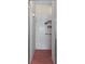 Bathroom view of a stand up shower with tile surround and glass door at 5143 Culbreath Rd, Brooksville, FL 34601