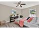 Cozy bedroom featuring neutral walls, plank flooring, and a comfortable bed with stylish bedding at 5721 12Th S Ave, Gulfport, FL 33707