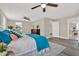 Spacious main bedroom with ceiling fan, wood floors and large windows at 5721 12Th S Ave, Gulfport, FL 33707