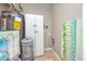 Storage area with water heater, supply buckets and cabinets at 5721 12Th S Ave, Gulfport, FL 33707