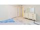 Bright bedroom with dresser and large closet at 907 La Jolla Ave, Sun City Center, FL 33573
