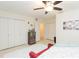 Spacious bedroom with double closets and ceiling fan at 907 La Jolla Ave, Sun City Center, FL 33573