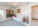 Relaxing sunroom with access to dining area and plenty of natural light at 907 La Jolla Ave, Sun City Center, FL 33573