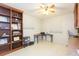 Home office with built-in shelves and desk at 907 La Jolla Ave, Sun City Center, FL 33573